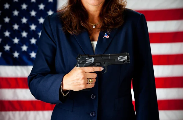 Siyasetçi: bir 45'lik silah tutan — Stok fotoğraf
