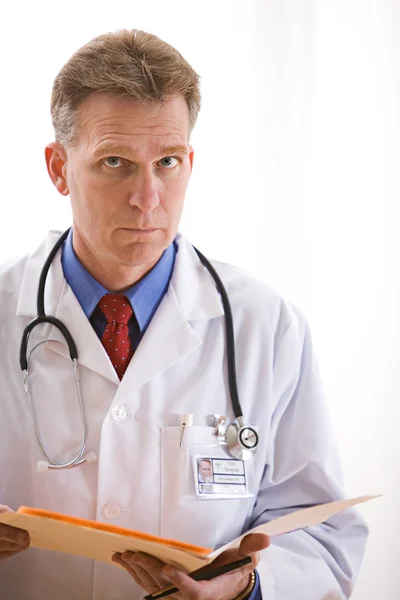 Doctors: Serious Physician with Test Results — Stock Photo, Image