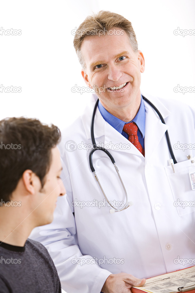 Doctors Doctor Stands with Patient — Stock Photo © sjlocke 25701695