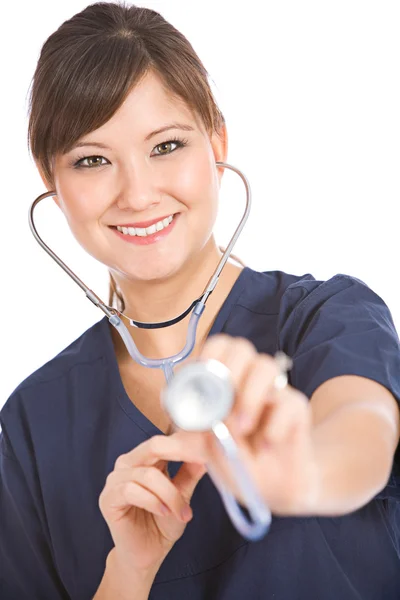 Nurse: Nurse with Stethoscope Looks at Camera — Stock Photo, Image