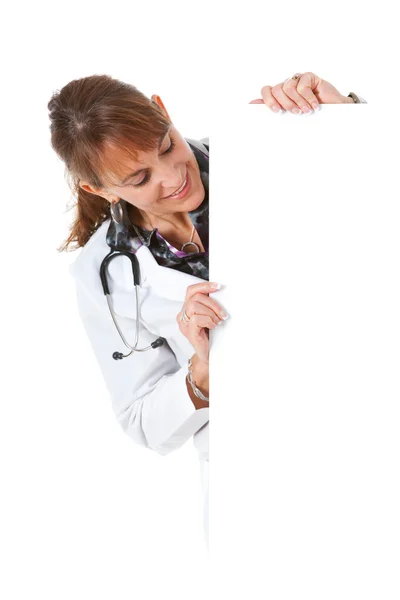 Doctor: Doctor Peeking Around White Card — Stock Photo, Image