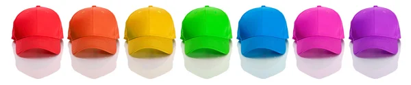 Бейсбол: ряд радужных цветных бейсбольных шапок — стоковое фото