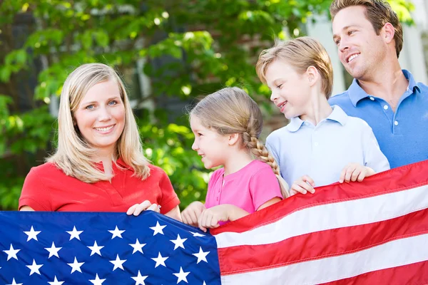 Summer: Family with American Flag Stock Photo