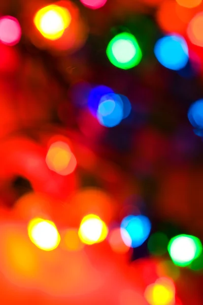 Natal: desfocado, colorido, luzes de Natal de férias — Fotografia de Stock