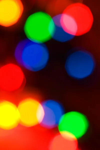 Jul: defocused, färgglada, holiday julbelysning — Stockfoto