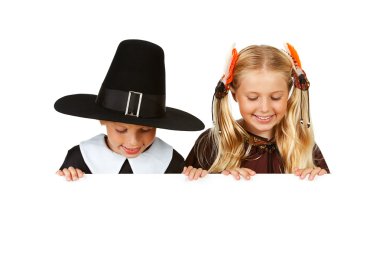 Thanksgiving: Pilgrim and Indian Look Down clipart