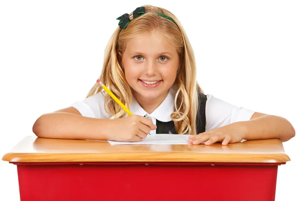 Student: Young Girl Working on Assignment Royalty Free Stock Images