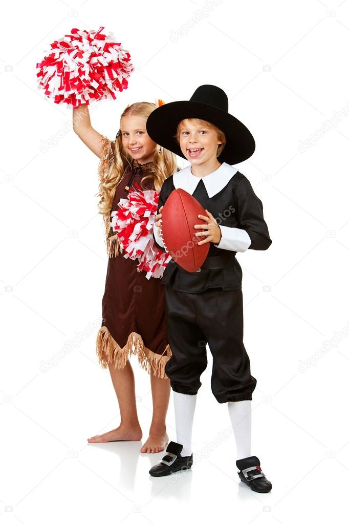 Series With Children Dressed In Costume To Celebrate The American Thanksgiving Holiday Boy As Pigrim Girl Native