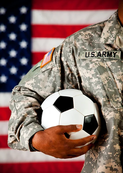 Soldier: Holding a Soccer Ball — Stock Photo, Image