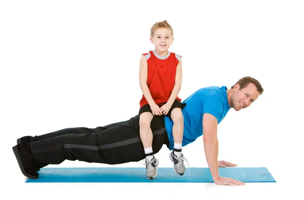 Family: Boy Helps Dad Get Better Workout — Stock Photo, Image