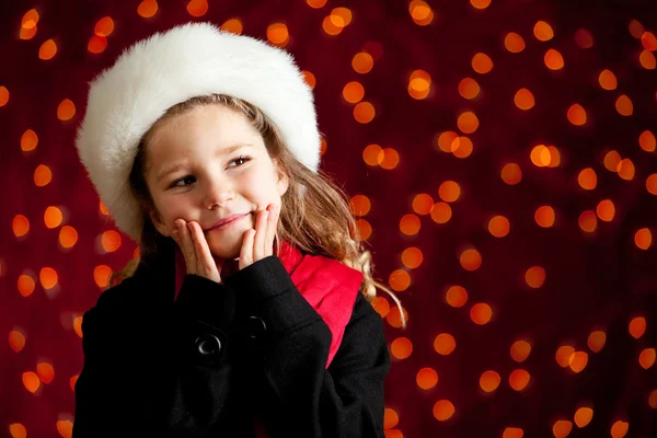 Weihnachten: Wintermädchen mit Urlaubswunsch — Stockfoto