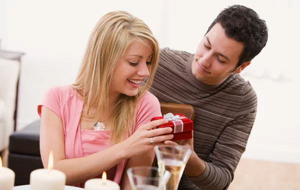 Valentine 's: Woman Excited To Receive Gift Стоковое Фото