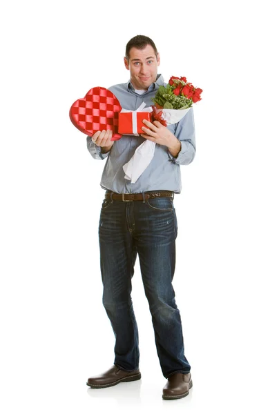San Valentín: Los brazos del hombre llenos de regalos — Foto de Stock
