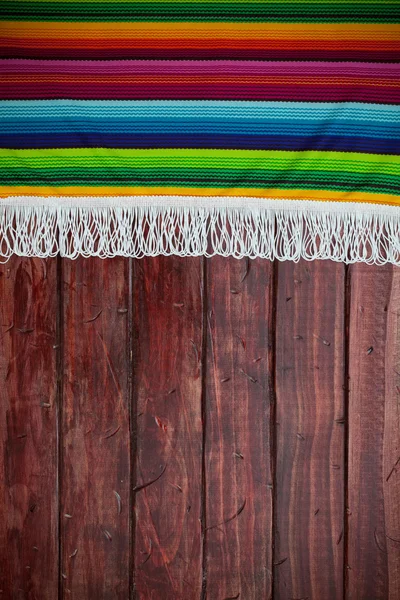Fundo: Cobertor mexicano com copyspace de mesa de madeira — Fotografia de Stock