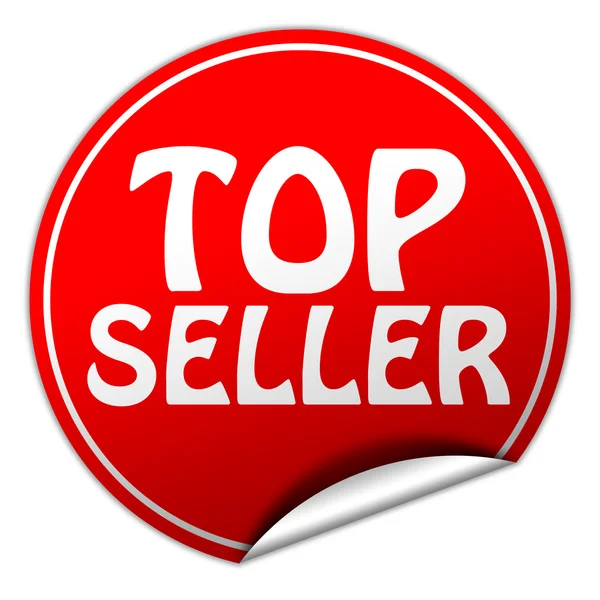 Top vendedor redondo etiqueta engomada roja sobre fondo blanco —  Fotos de Stock