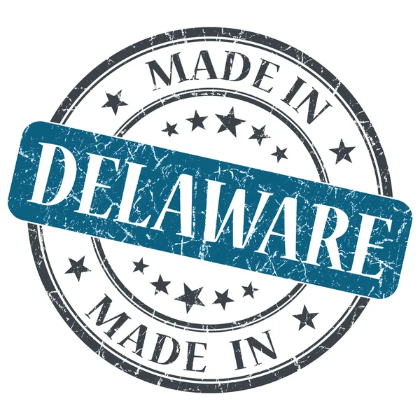 Fabriqué en Grunge ronde bleue Delaware timbre isolé — Photo