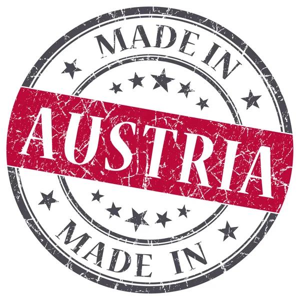 Made in Austria roter Grunge Rundstempel isoliert auf weißem Hintergrund — Stockfoto