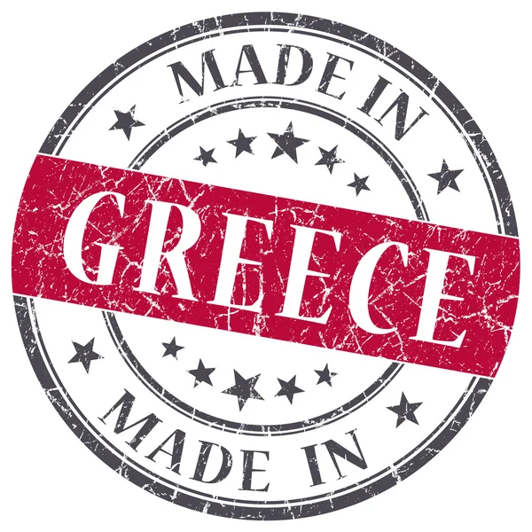 Feito na Grécia grunge vermelho carimbo redondo isolado no fundo branco — Fotografia de Stock