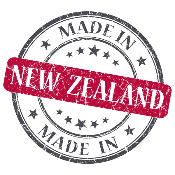 Made in NEW ZEALAND red grunge stamp isolated on white background — Stock Photo, Image