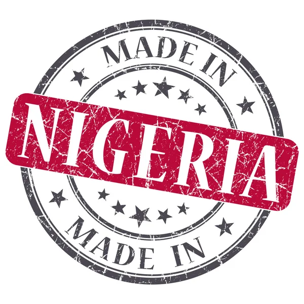 Made in nigeria red grunge stamp isoliert auf weißem Hintergrund — Stockfoto