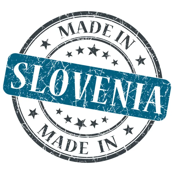 Fabriqué en Slovénie timbre rond grunge bleu isolé sur fond blanc — Photo