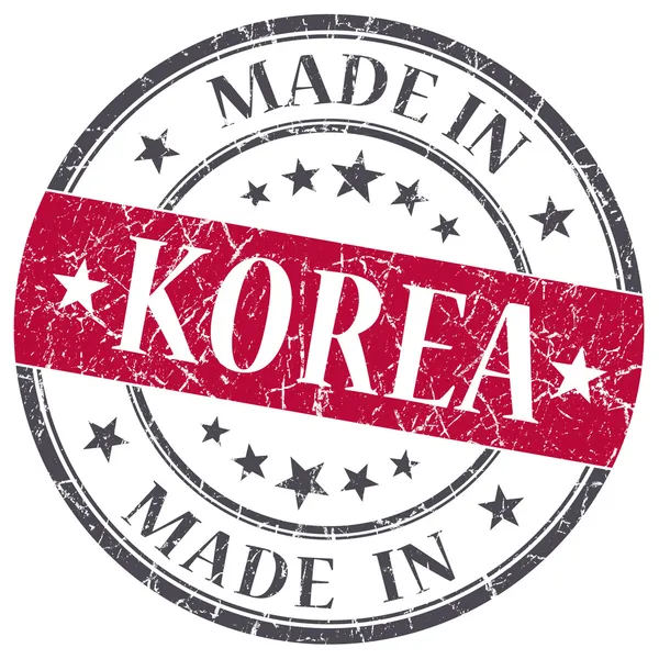 Made in Korea red grunge round stamp isoliert auf weißem Hintergrund — Stockfoto