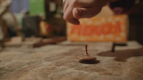 Handcrafted whirligig spins and stops — Stock Video