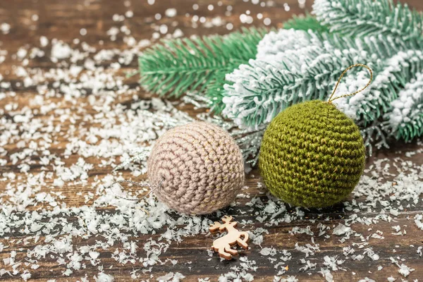 Crocheted Christmas Balls Holiday Decor Snow Covered Fir Tree Branches — Stockfoto