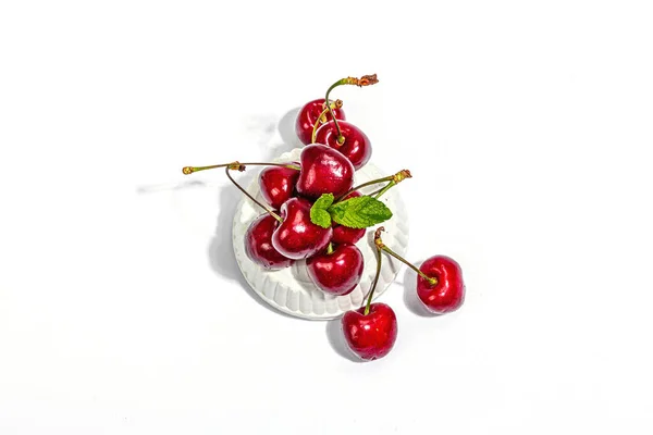Ripe Sweet Cherries Fresh Mint Leaves Isolated White Background Trendy — Stockfoto