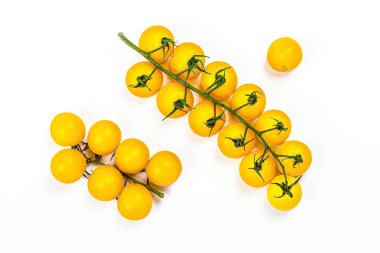 Yellow tomatoes cherry isolated on white background. Traditional ingredient for cooking healthy food, mockup, template, top view