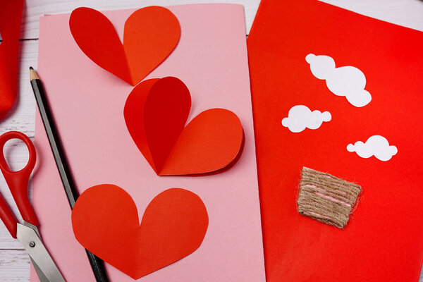 valentines day, handicrafts made of paper. Wood background