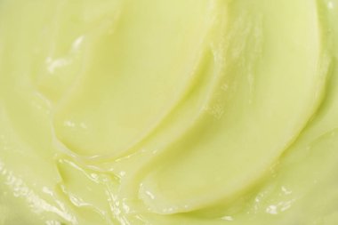 Güzellik kremi dokusu. Doğal yeşil losyon, nemlendirici, kremsi kozmetik ürün arka planı