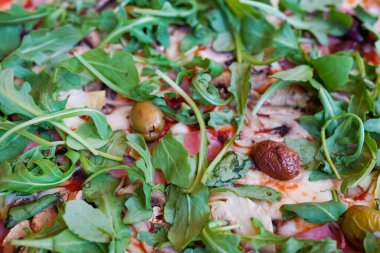 Pizza Margherita or Margarita with Mozzarella cheese, tomato, olive. Italian pizza in the cafe