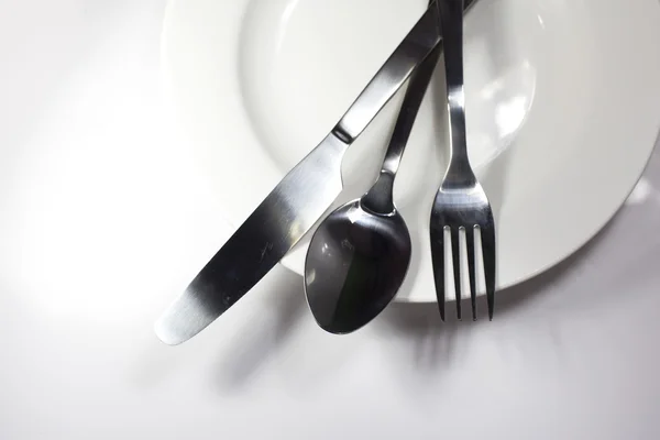 Vidlička lžíce a nůž izolovaných na bílém — Stock fotografie