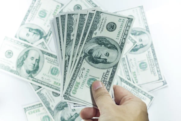 Hand with pack of one hundred dollars — Stock Photo, Image