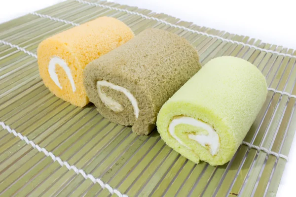 Színes szelet roll torta elrendezése — Stock Fotó