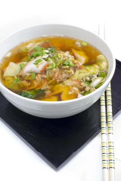 Soup with sliced pork and dumplings — Stock Photo, Image