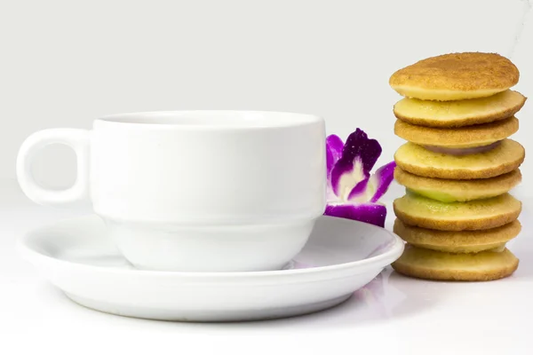 Coffee cup and saucer on a white background. — Stock Photo, Image