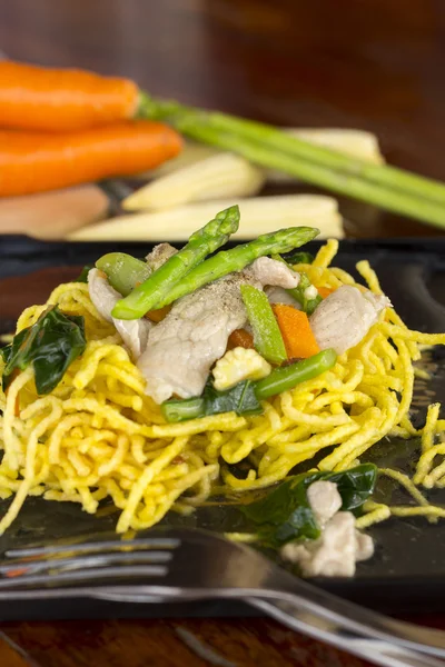 Topped with crispy noodles — Stock Photo, Image