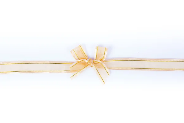 Arc cadou de aur izolat pe alb — Fotografie, imagine de stoc