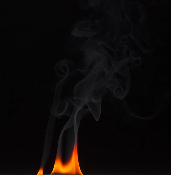 Fire flames on a background — Stock Photo, Image