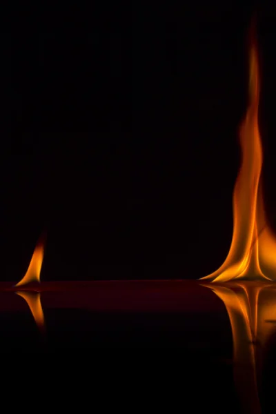 Fire flames on a background — Stock Photo, Image