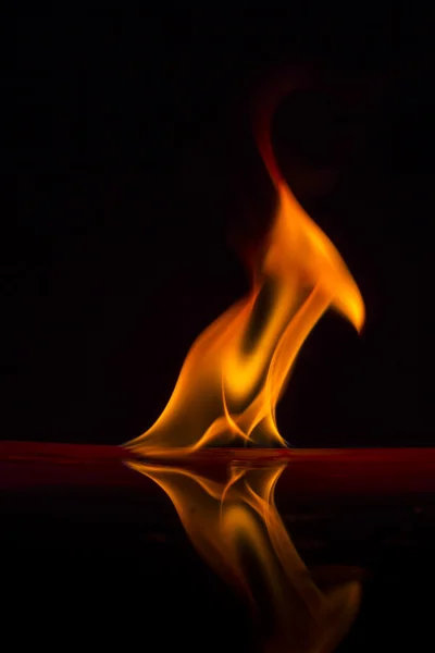 Fire flames on a background — Stock Photo, Image