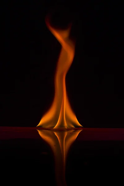 Fire flames on a background — Stock Photo, Image