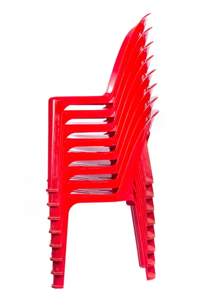 Рендеринг из сложенных красных стульев — стоковое фото