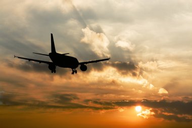 Beautiful view of silhouette of airplane clipart