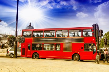 The red double decker bus. clipart