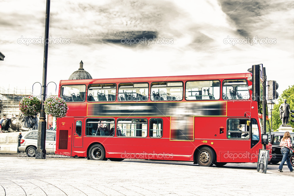The red double decker bus.