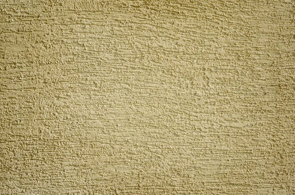 De textuur van de beige pleister op de muur — Stockfoto