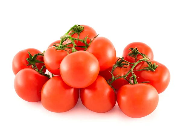 Pile of red tomato bunches over white background — Stock Photo, Image